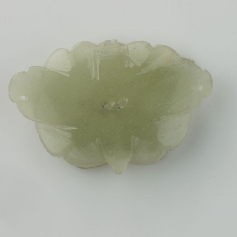 Antique 20th century Chinese carved nephrite jade toggle or button.