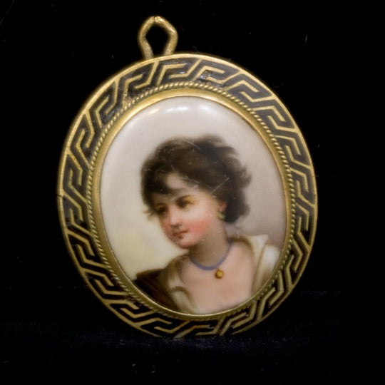 Mid Victorian hand painted porcelain and enamel portrait locket. pdvc446