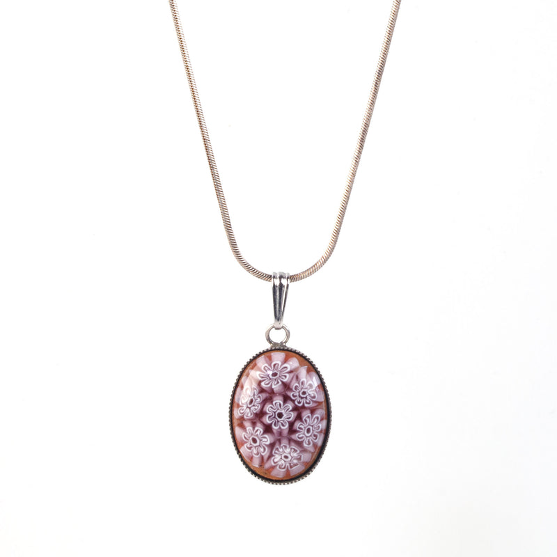 Small Murano oval millefiori glass pendant in silver bezel setting. 16 inch sterling chain