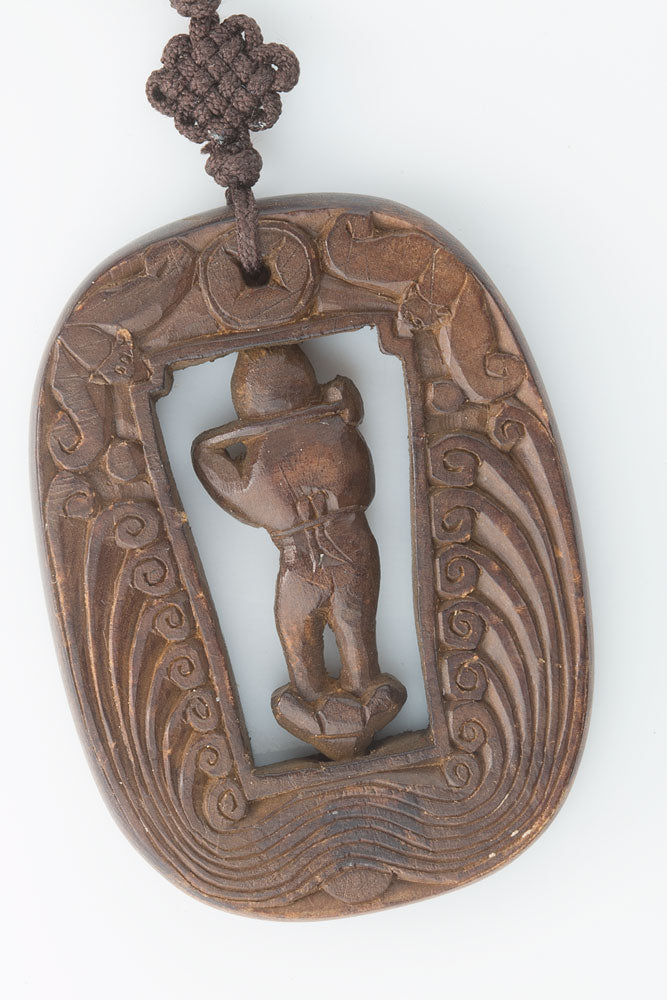 Vintage Chinese carved wood swiveling deity with two bats descending from heaven pendant
