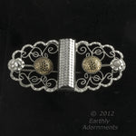 Art Deco filigree plated silver and glass brooch.