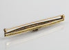 Art Deco 14k white and yellow gold bar pin with diamond.