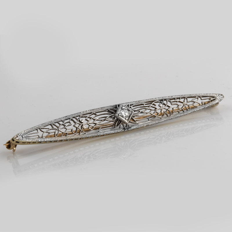 Art Deco 14k white and yellow gold bar pin with diamond.