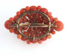 Antique Victorian 10k gold salmon coral 5 tier domed cluster brooch.