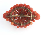 Antique Victorian 10k gold salmon coral 5 tier domed cluster brooch.