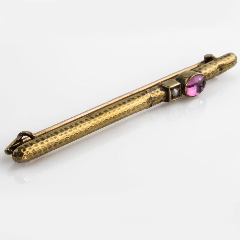 Victorian gold filled bar pin with hammered textured surface with rose cut diamond and amethyst stone