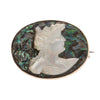 Victorian mother of pearl and abalone cameo pin in gold filled setting. 1.2 x 1 inches