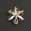 Antique Victorian sterling silver goldwash vermeil seed pearl starburst pin.