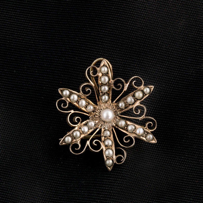 Antique Victorian sterling silver goldwash vermeil seed pearl starburst pin.