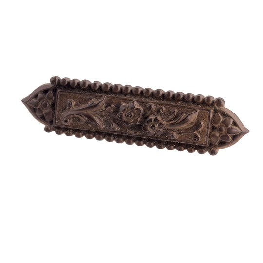 Victorian pressed horn brooch with floral design. j-pnvc984
