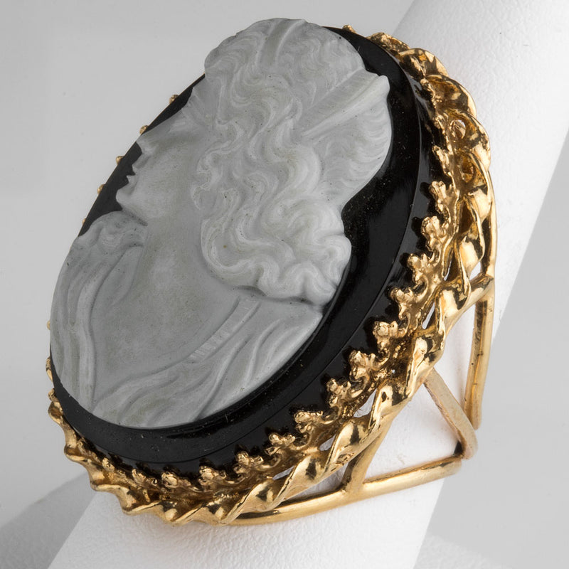 Cameo carved from single bulls eye agate stone set in 14k gold ring setting Size 7.