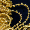 Vintage honey opalescent rocailles, size 9 on braided string per foot. 