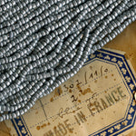 Antique French matte aluminum glass seed bead Size 10 . 50 gram hank