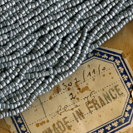 Antique French matte aluminum glass seed bead Size 10 . 58-9 gram hank. b17-105