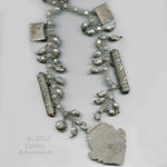 Antique large Islamic Central Asian tribal silver amulet and talisman chain necklace.