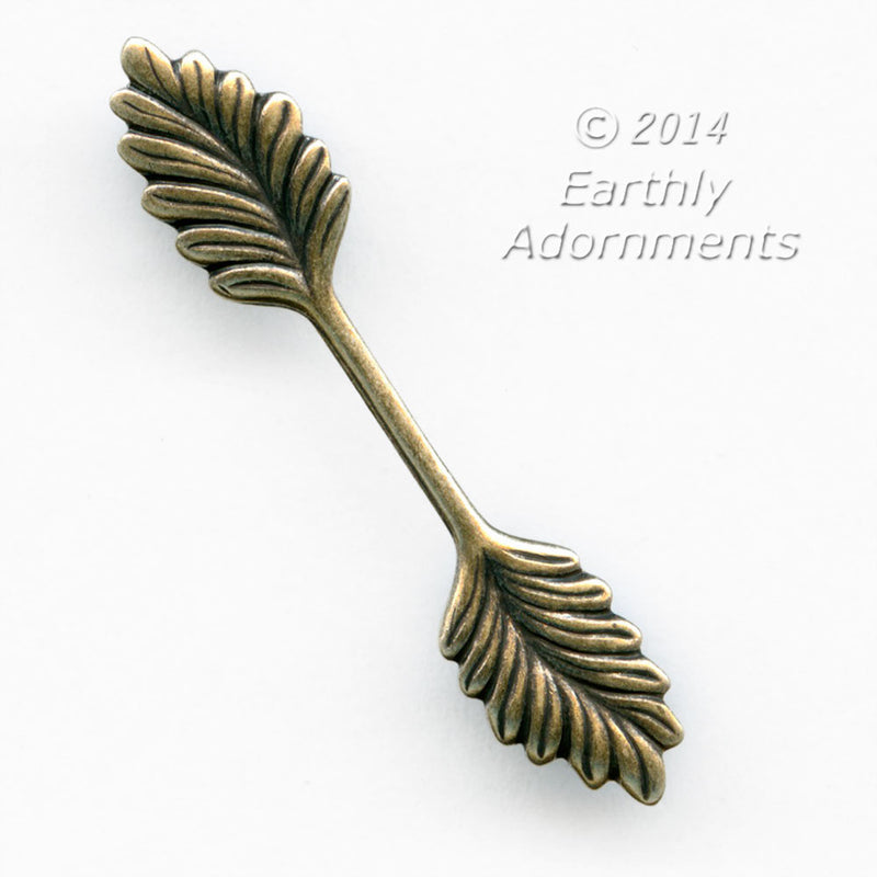 Fold over bail with leaf design. 35x5mm. Pkg. of 4.